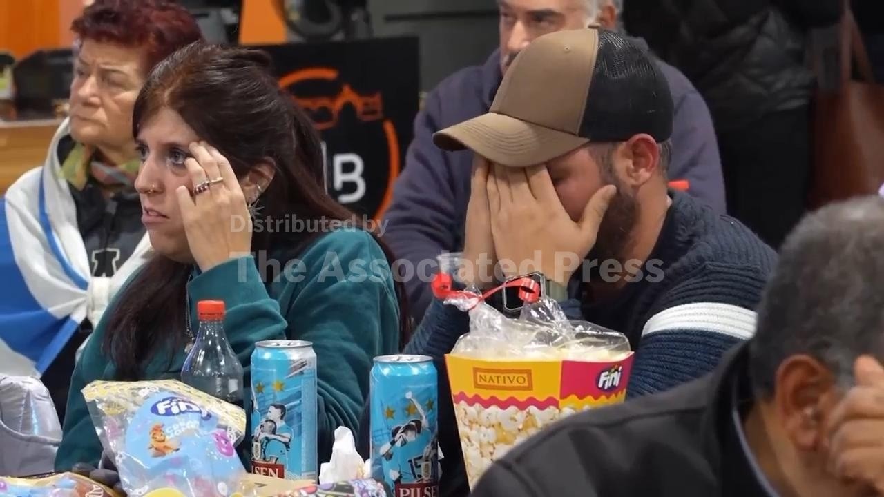 Uruguayans distraught as defeat against Spain confirms World Cup exit