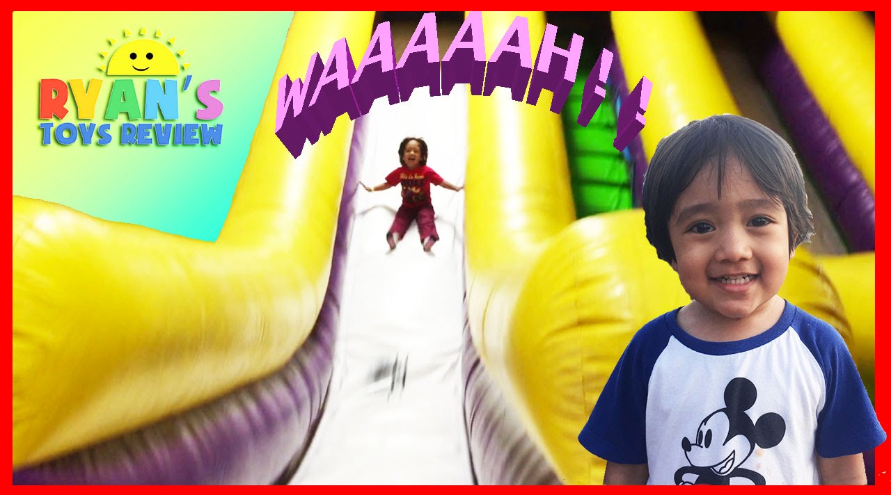 Ryan plays on HUGE Indoor playground GIANT INFLATABLE SLIDES