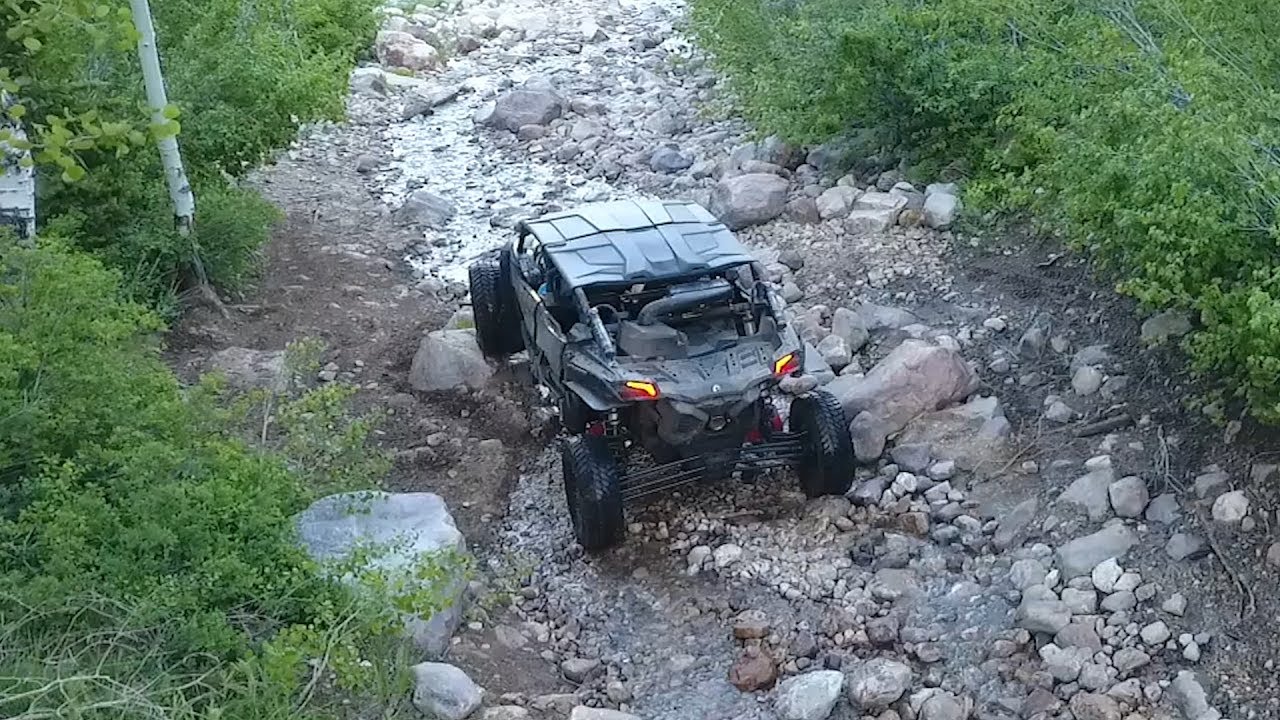 CAN AM MAVERICK X3 X RS FLOODED RIVER ROCK CRAWLING REVIEW (DRONE SHOTS)