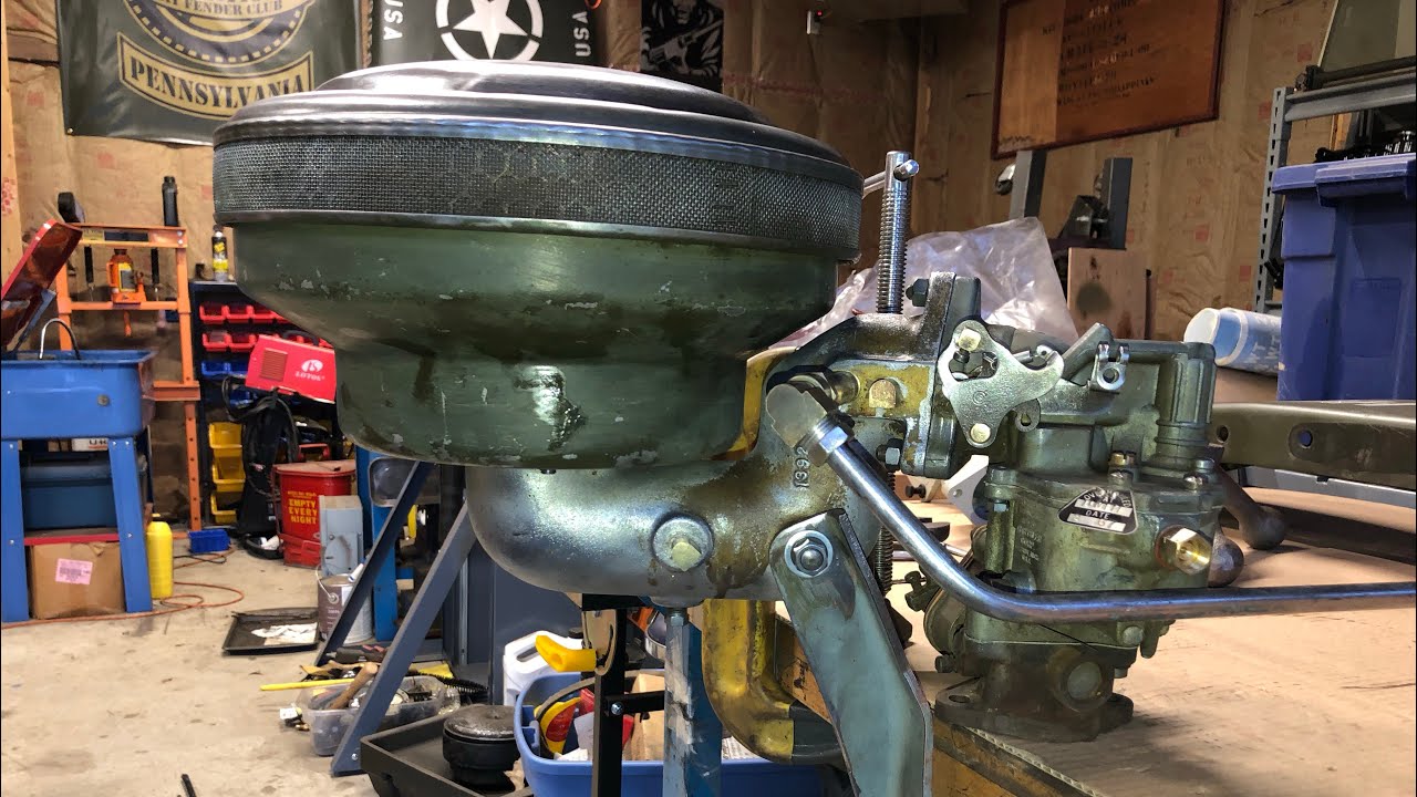 Working on a Dodge M37 ETW1 carburetor system.