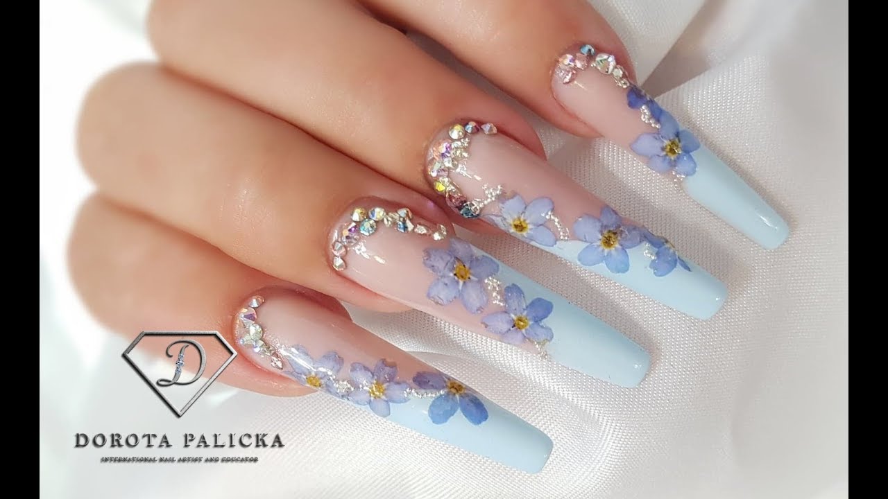 Episode #9 coffin shape gel nails, ballerina nail shape with blue gel encapsulated flowers. Nail art