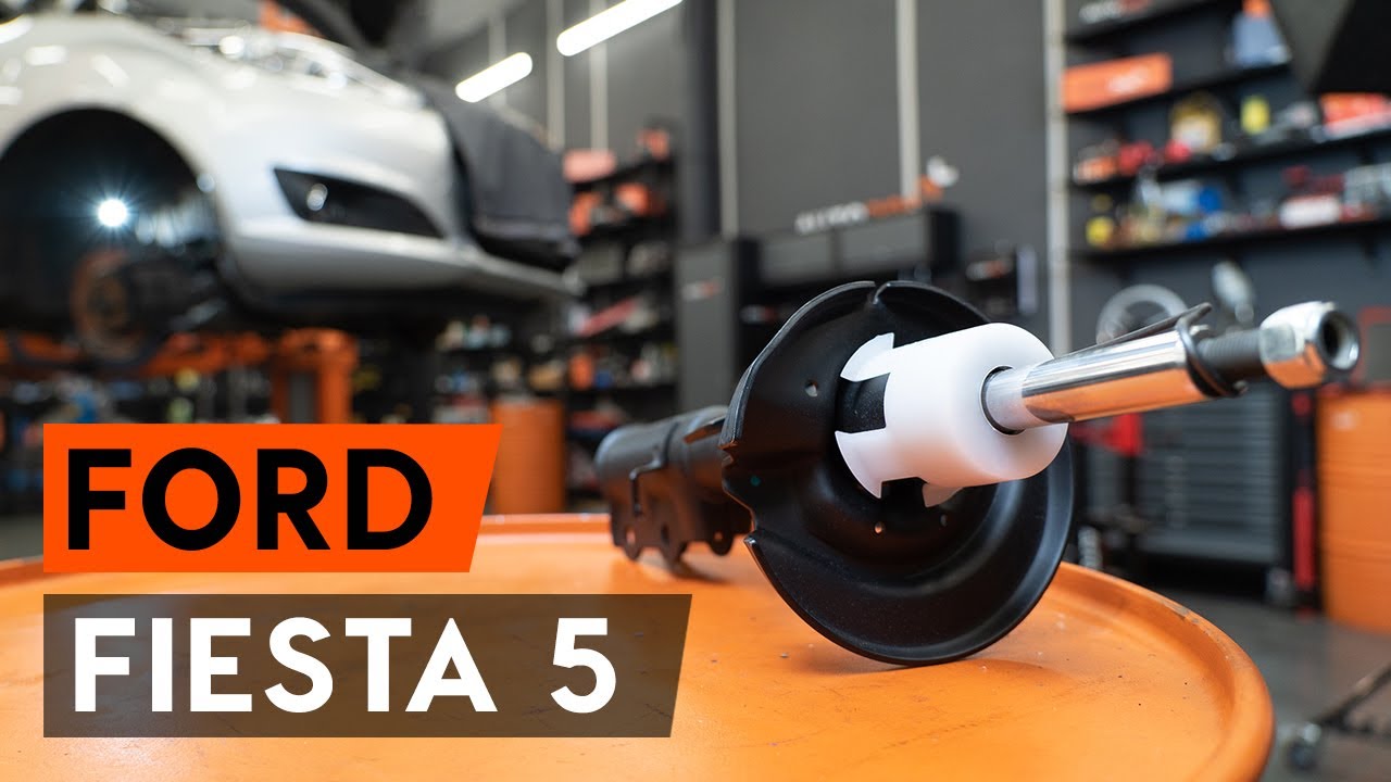 How to change a front shock strut on FORD FIESTA V JH, JD  [TUTORIAL AUTODOC]