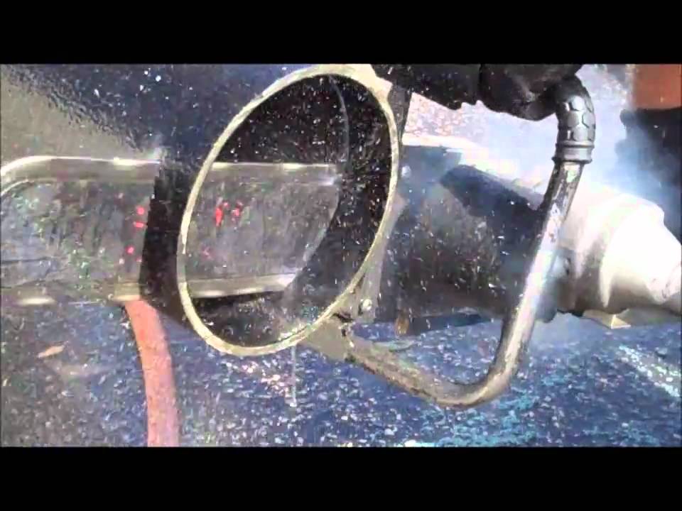 U.S. Saws' Air Chainsaw Cutting a Ductile Iron Pipe