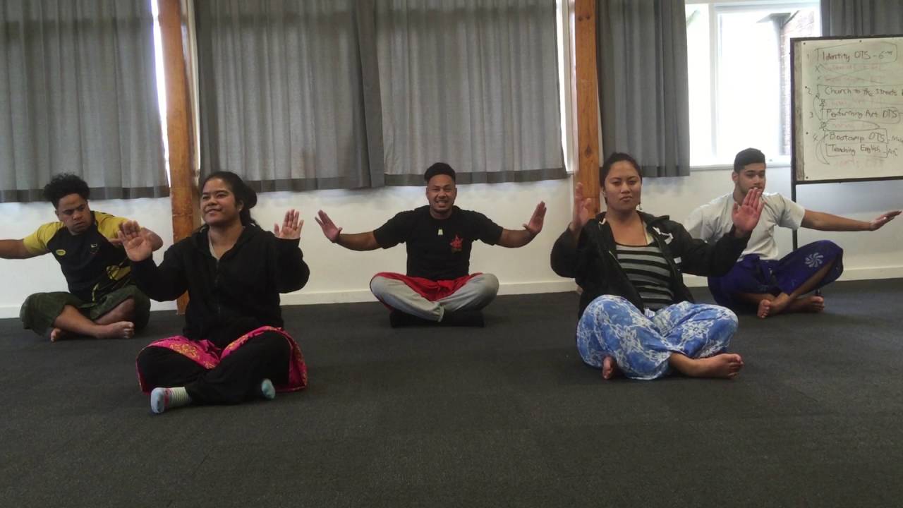 Staffs practicing Samoan sasa