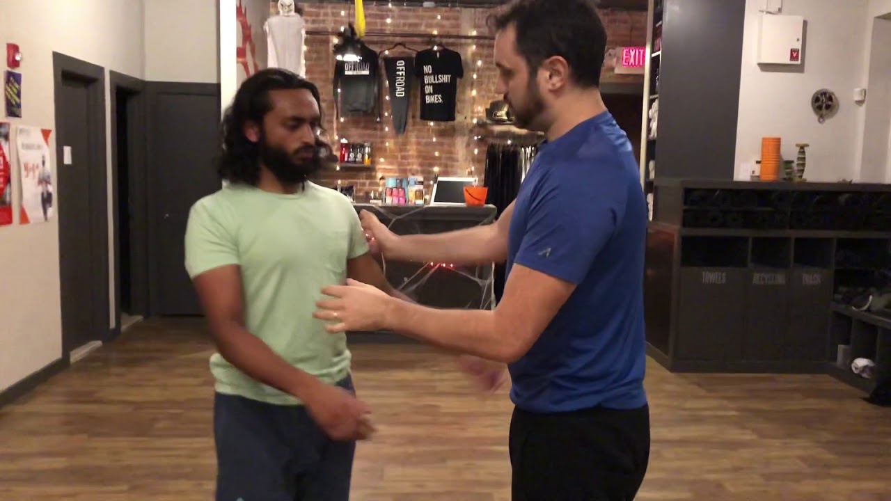 WING CHUN: How to use Chi Sao to block hook punches