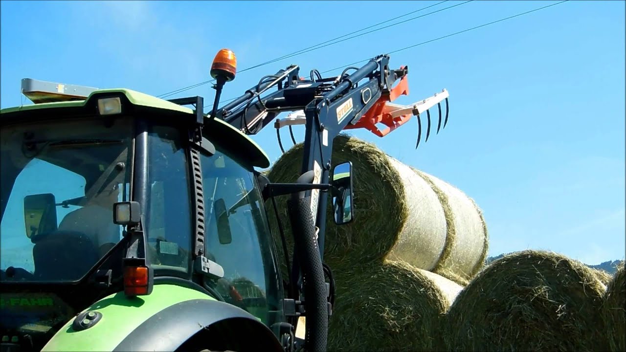 Deutz Fahr Agrotron 120 ramassage des balles