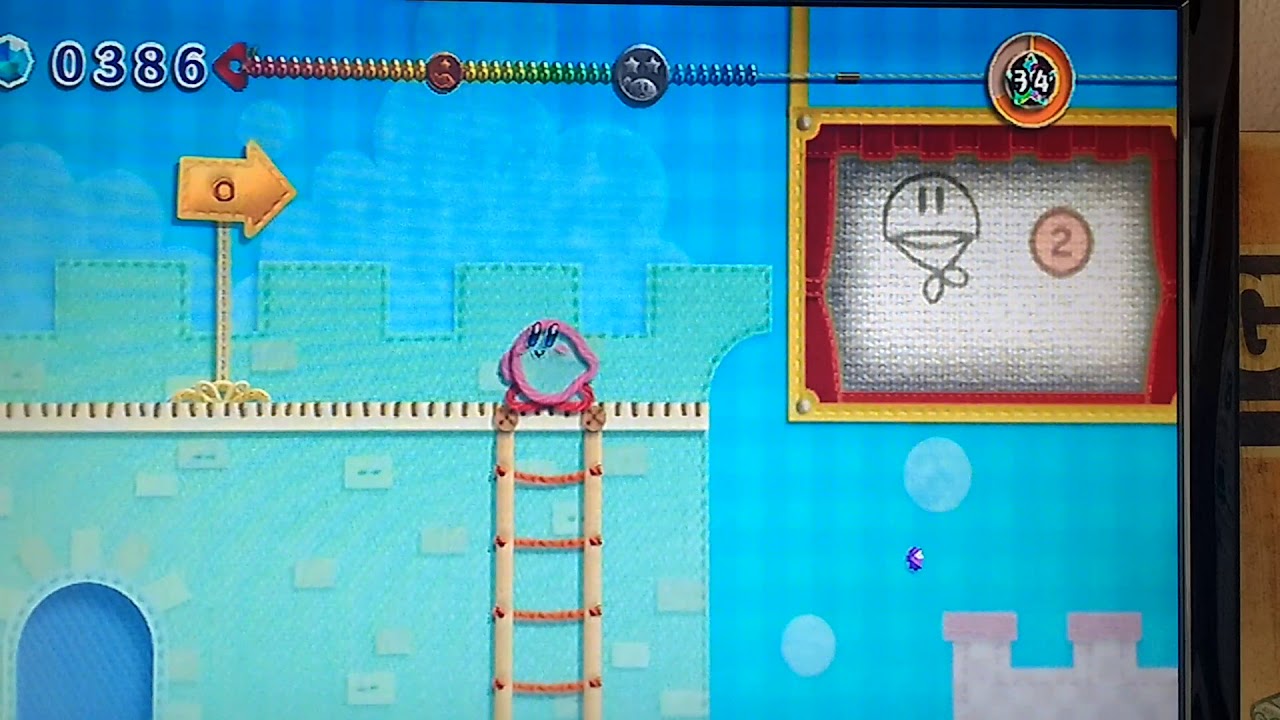 Mamby juega a Kirby&acute;s Epic Yarn Wii