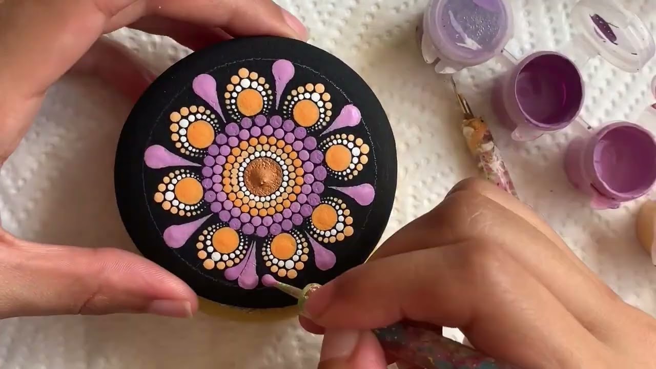 Vibrant mandala dotted using Rock Paint