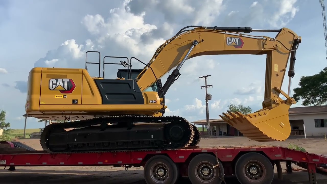 ESCAVADEIRA HIDRÁULICA CAT 345CG GIGANTE MOSTRANDO A MÁQUINA