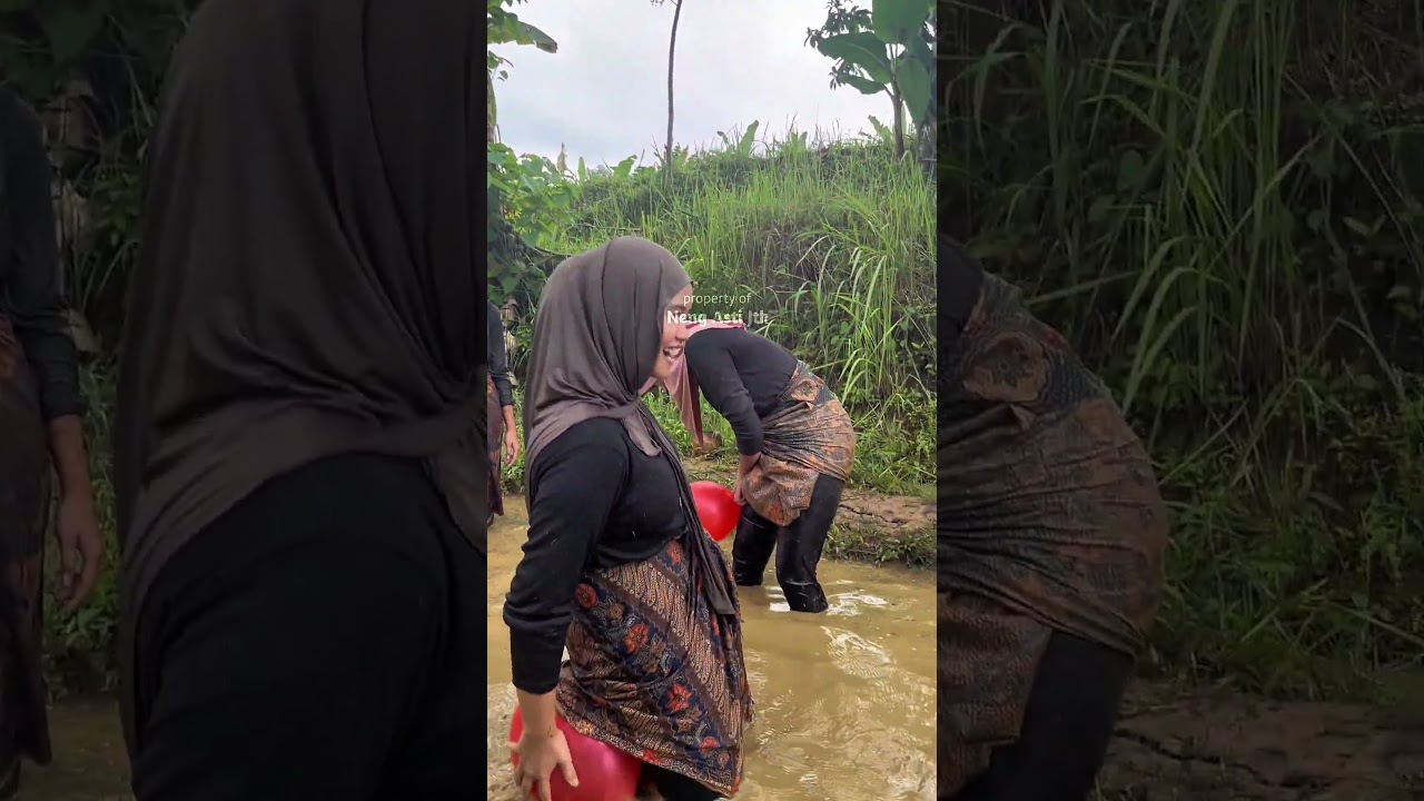 the excitement of the village girl playing mud in the paddy fields