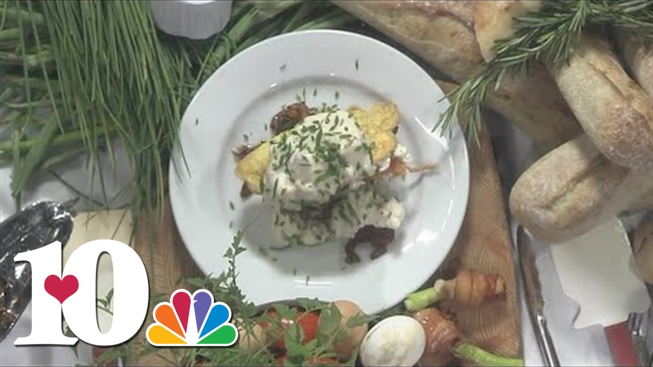 Making flambé steak benedict with lobster Mornay sauce