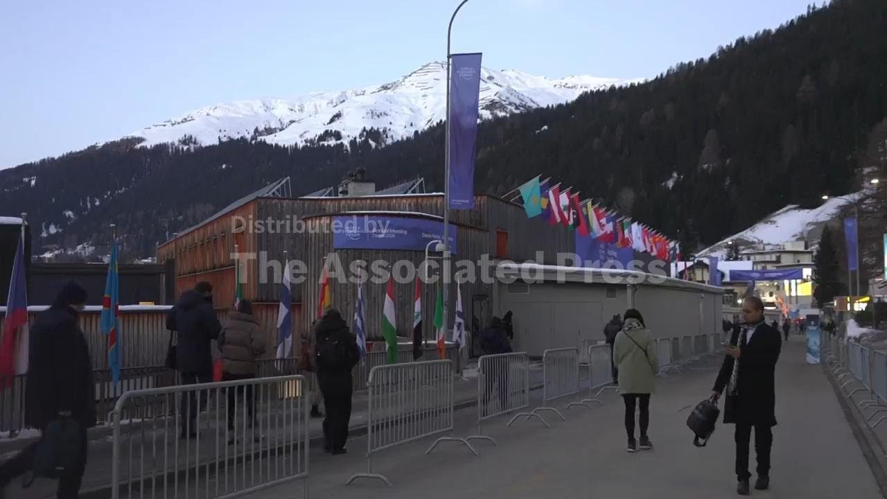 Morning shots of World Economic Forum as Trump's arrival delayed