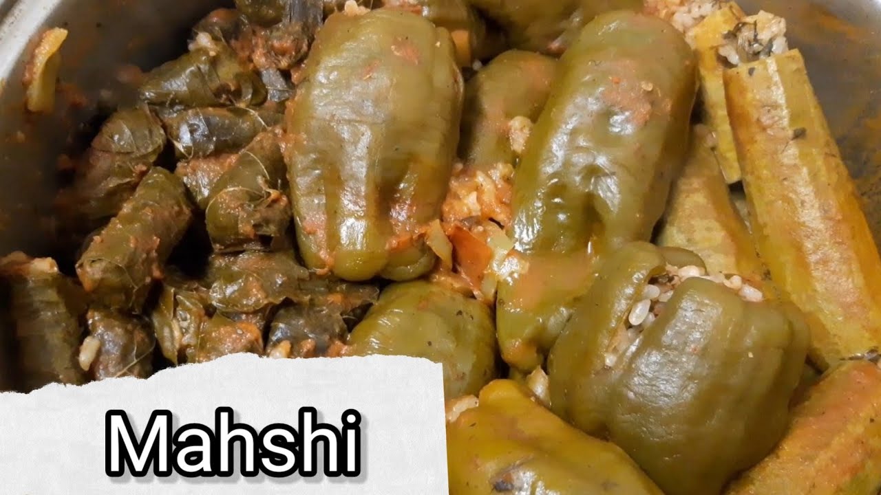 Delicious Egyptian Mahshi [ Egyptian stuffed vegetables] stuffed Zucchini, Grape leaves & Pepper