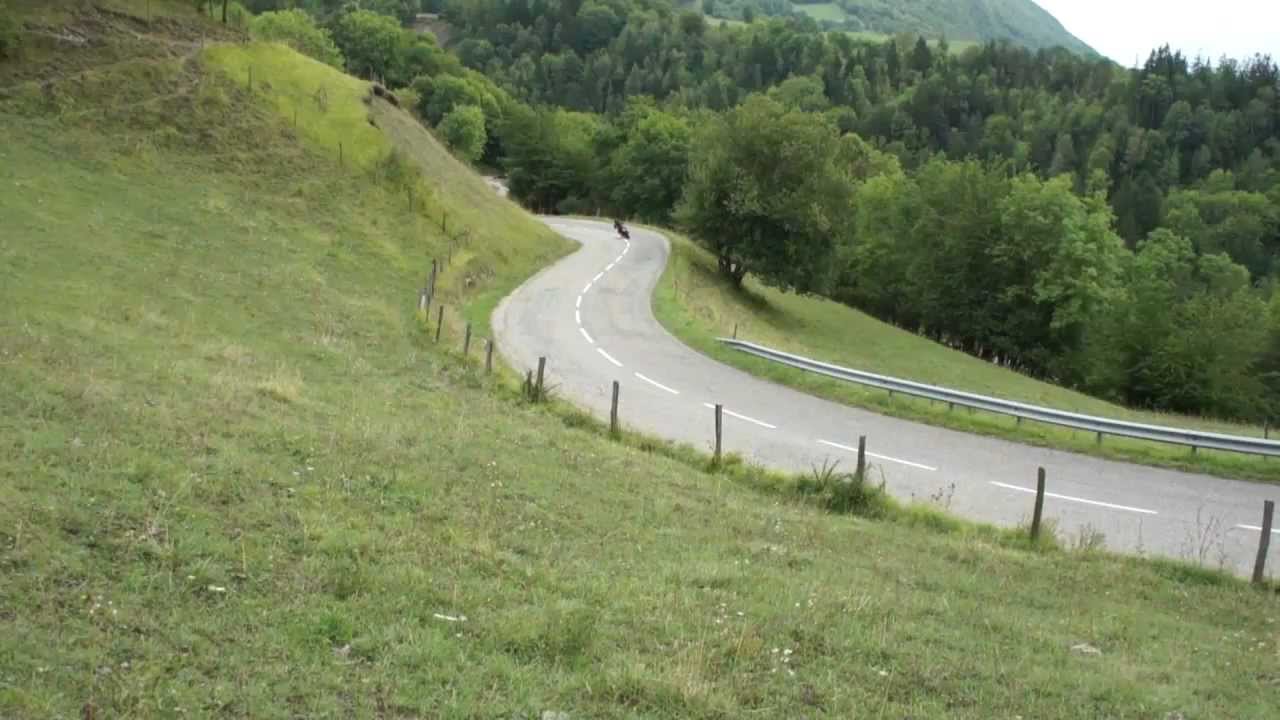SV 650 N LeoVince on mountain road.