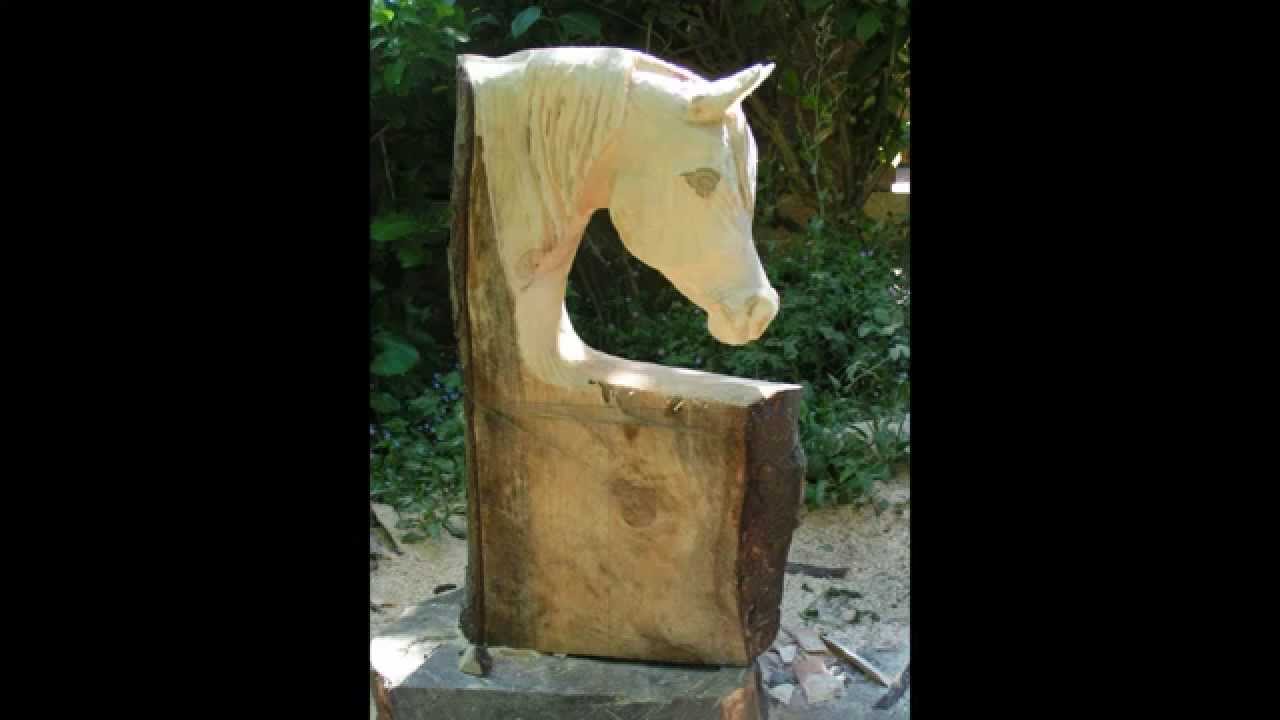 Arabian Horse head bench by chainsaw carver