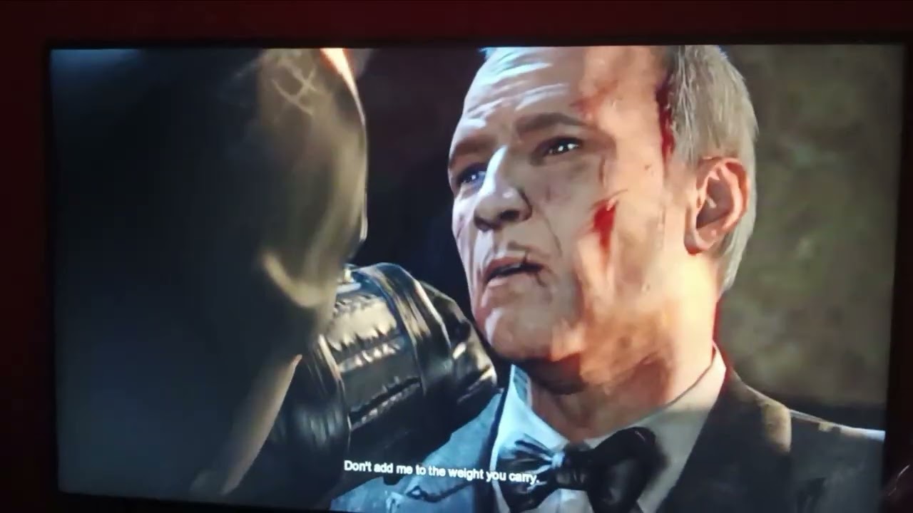 Bane destroying the batcave and batman saves alfred 