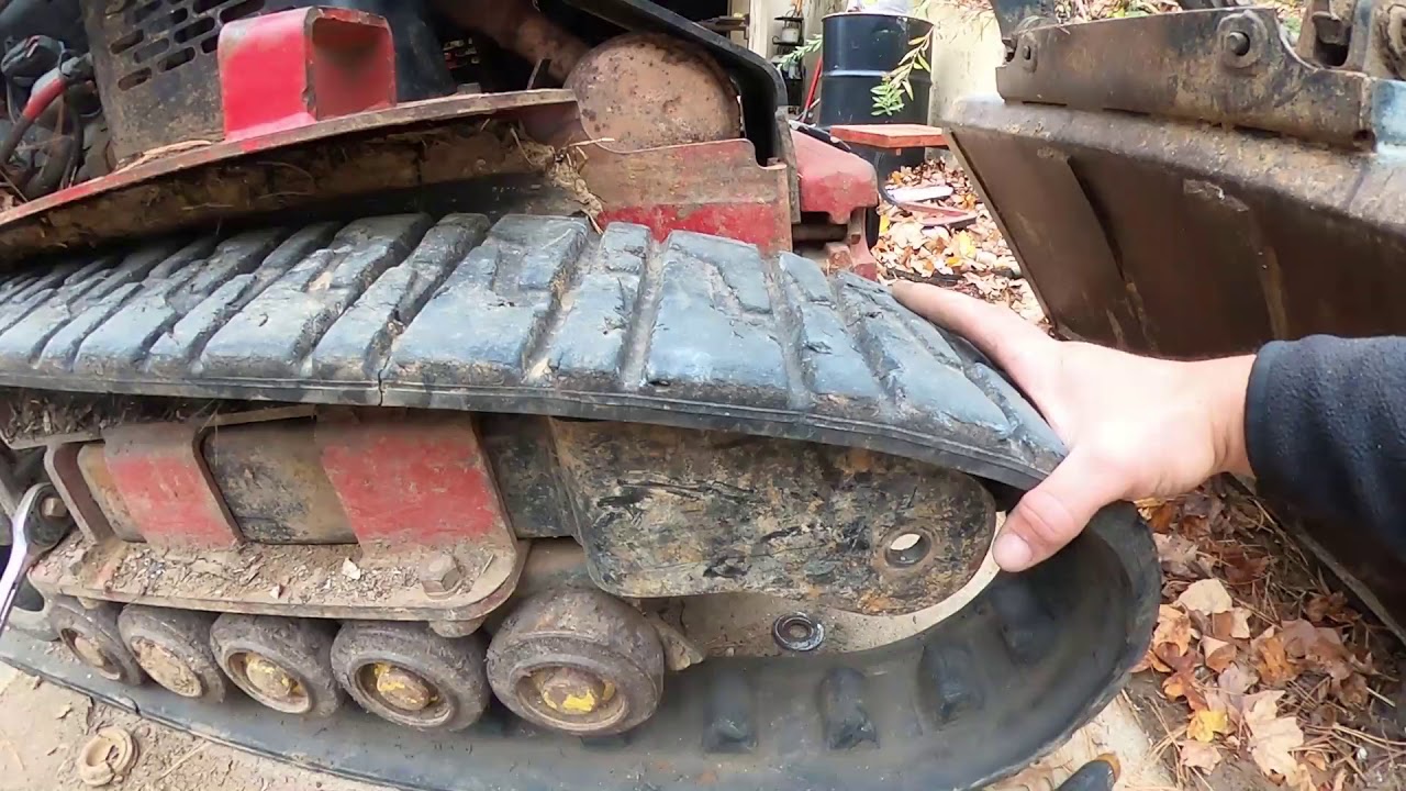 Dingo tx420 tensioner wheel replacement