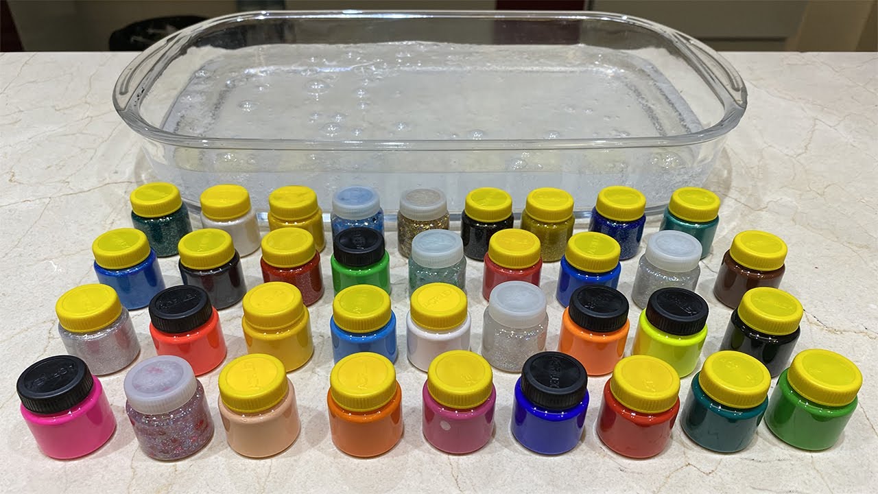 COLOQUEI 36 POTINHOS DE TINTA NO SLIME TRANSPARENTE GIGANTE!!!