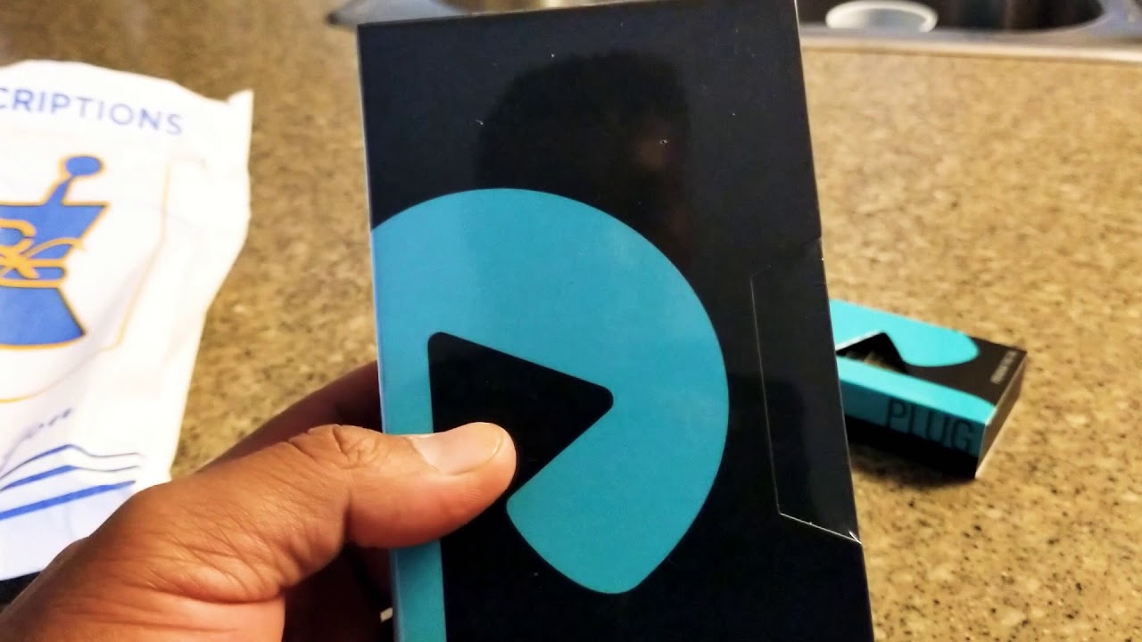 Unboxing a plug and play vape
