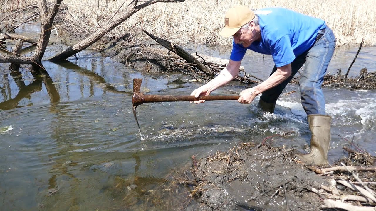 Chopping Out a Beaver Dam