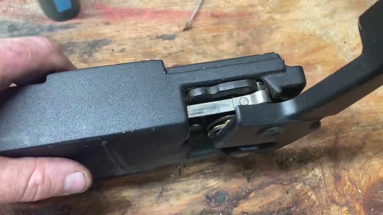 Explanation of the Mcculloch 610 chain break repair.  Or at least the best I can.