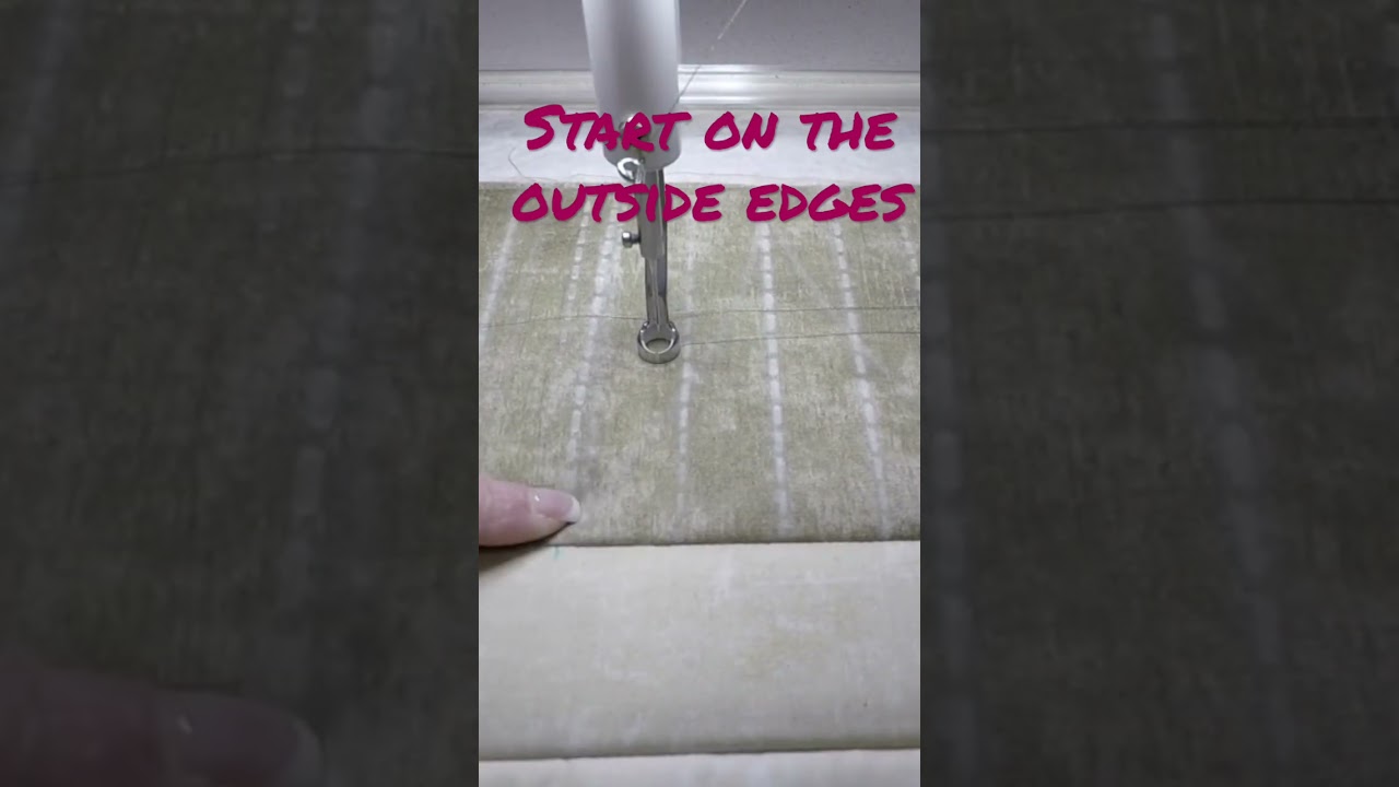 Marking a border for custom quilting.