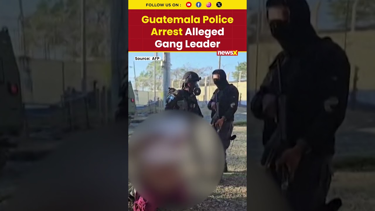 Guatemala Police Lead Away Alleged Gang Leader During Prison Operation Amid Violence