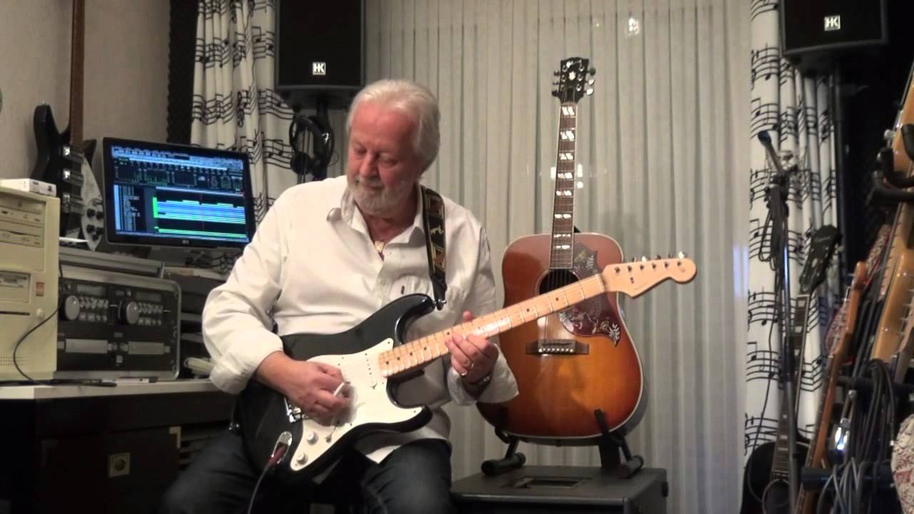 Island in the Sun - Harry Belafonte (played on guitar by Eric)