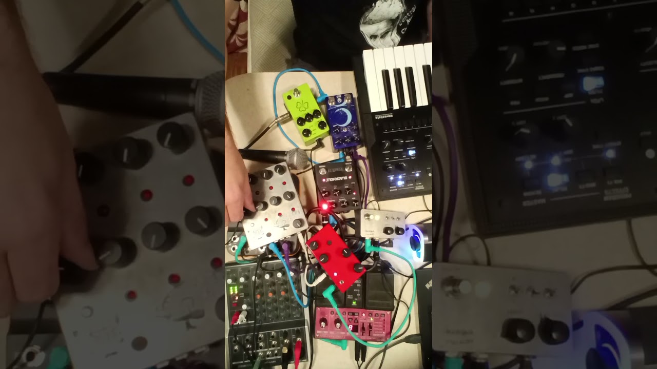 Pile of pedals on my desk making noisy synth music