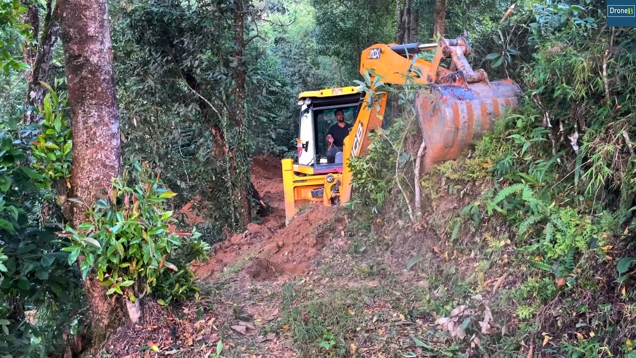 Felling Trees and Opening New Mountain Road out on Hillside with JCB Backhoe