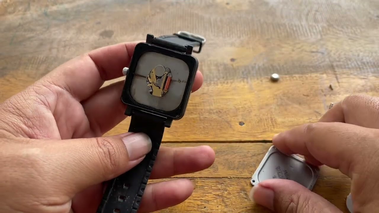 Mengganti baterai jam Q&Q quartz