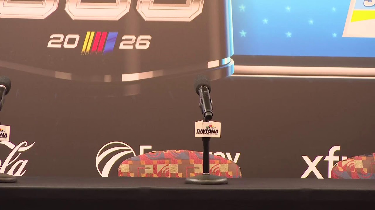 Tyler Reddick, his Crew Chief, and team leadership: Denny Hamlin head to the media