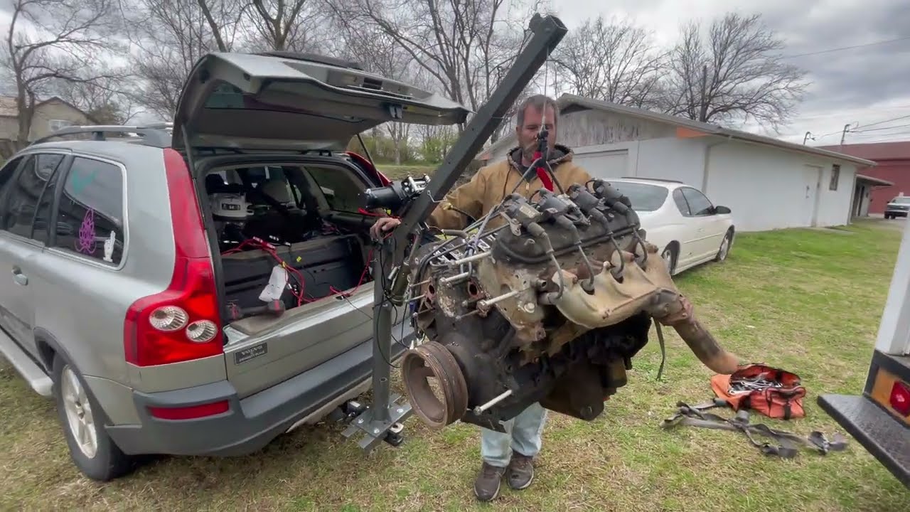 Harbor freight bed crane modified with electric winch welded to hitch receiver...