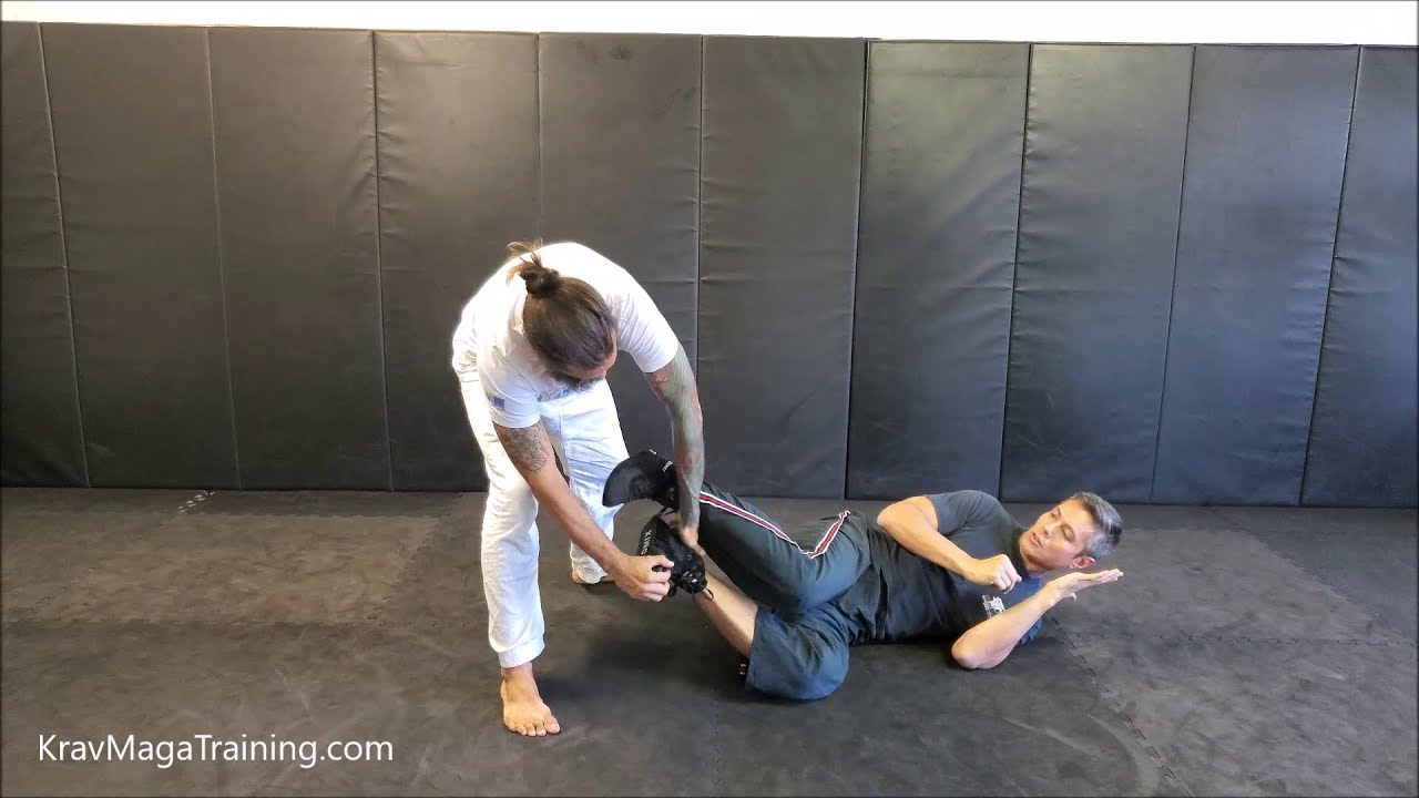 Krav Maga - Foot Grab:  Spinning Outward - Round Kick (Striking With Your Shin)