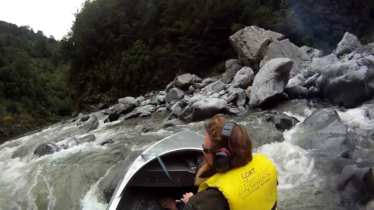 Jetboating in the mountains , New Zealand