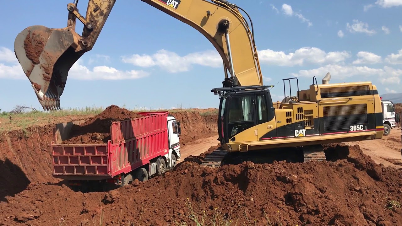 Caterpillar 365C Excavator Loading Trucks - Operator View