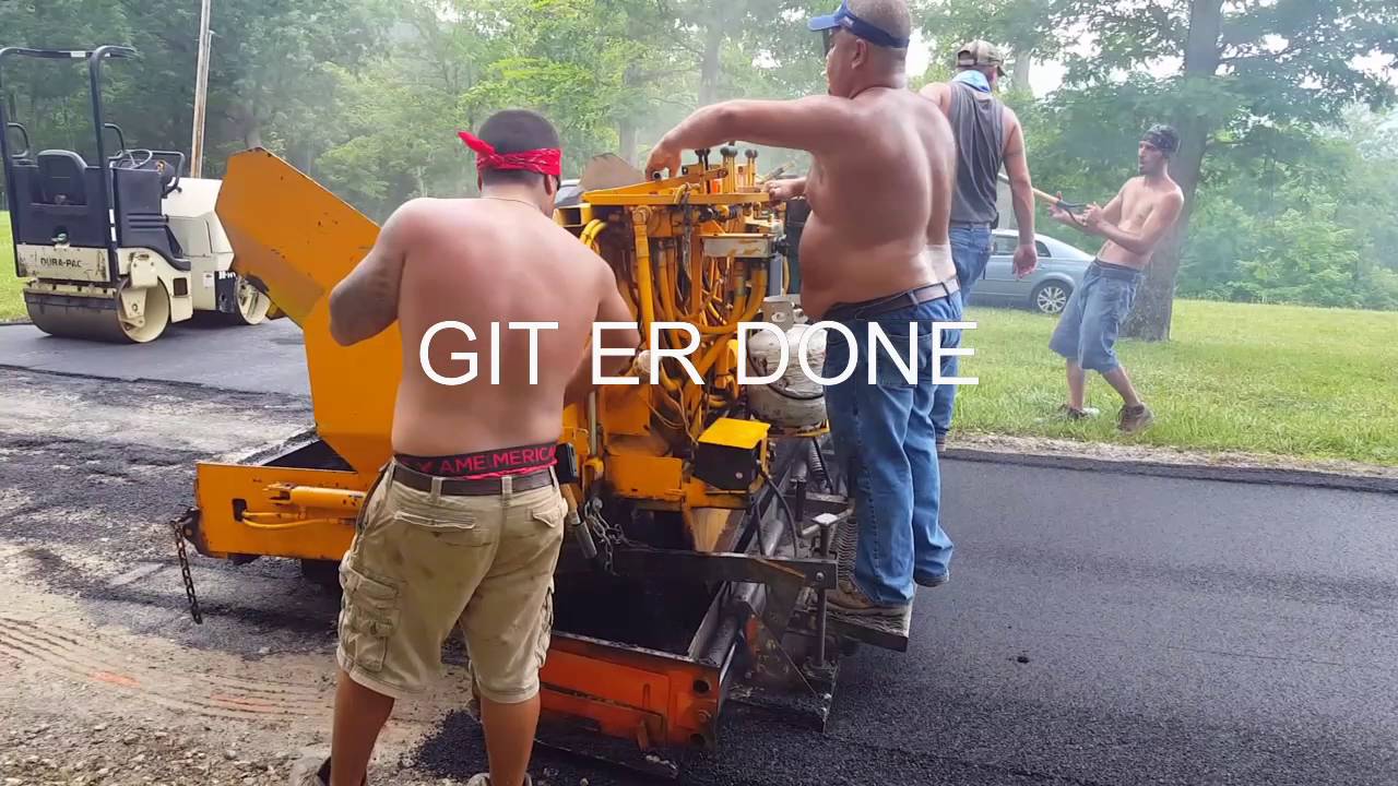 Paving a driveway.