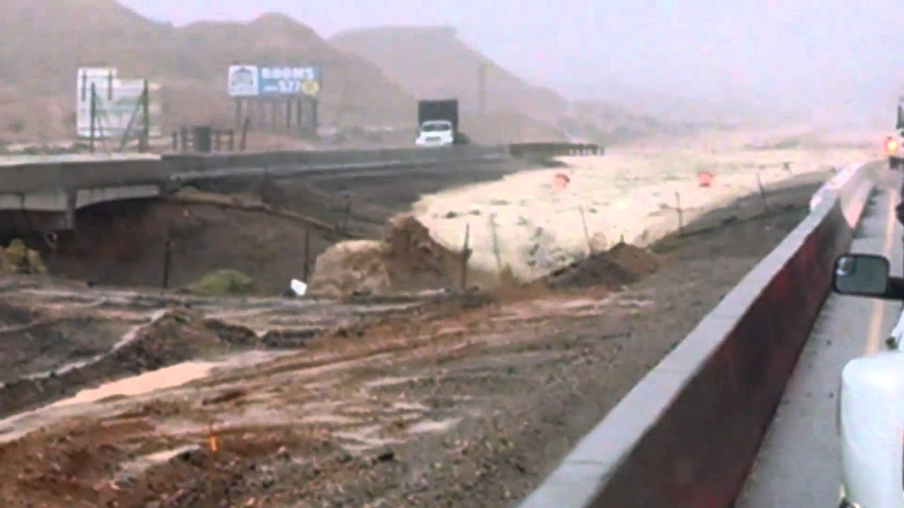 Caught on tape: minivan washed off I-15 near Las Vegas