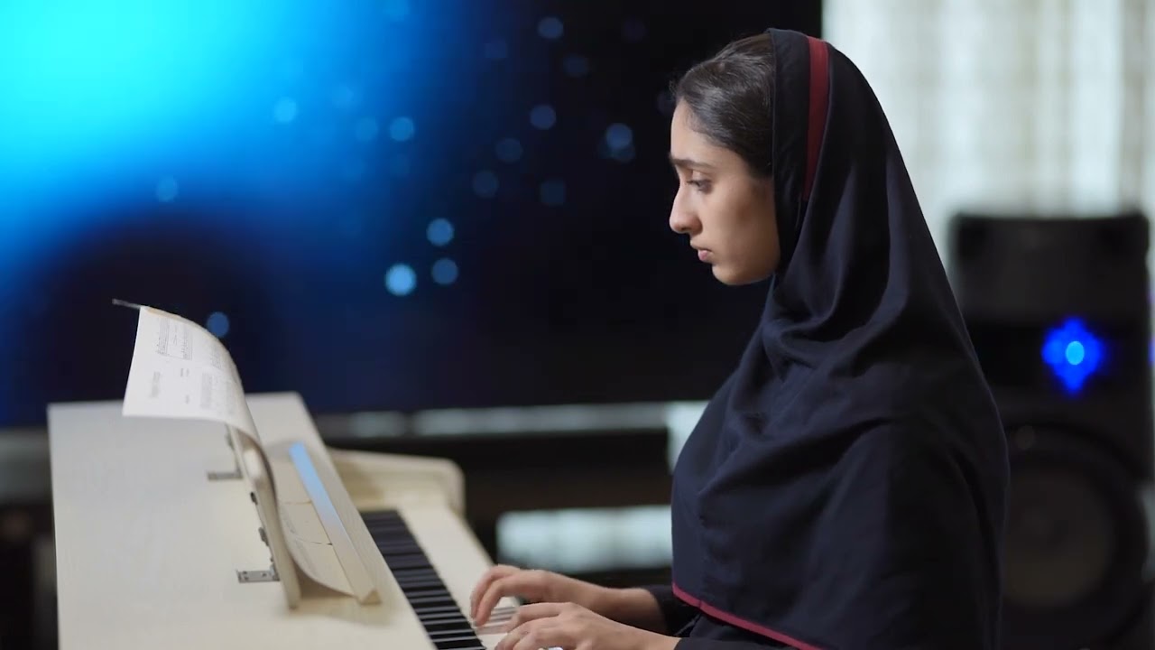 Playing ghoghaye setaregan from 40 ahang book for the school competition by piano