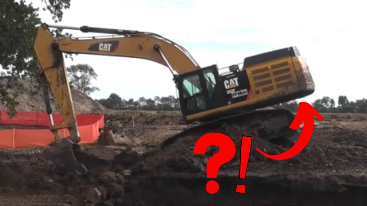 Massive CAT352 Excavator Loading Articulated Haulers