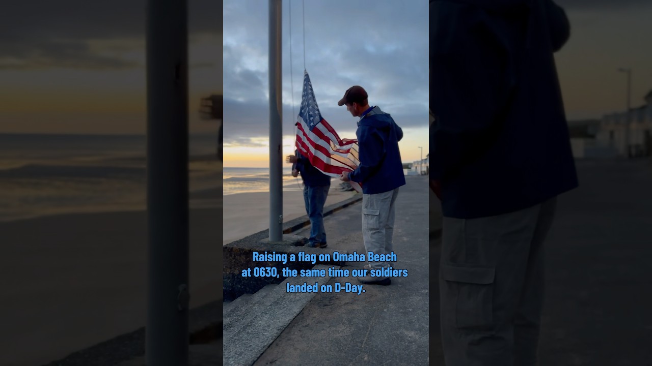 Raising a flag on Omaha Beach at 0630, the same time our soldiers landed on D-Day.  #ww2history