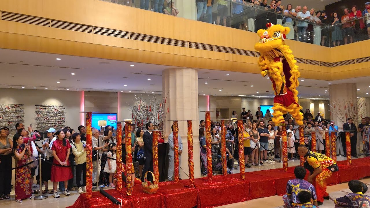 2026 lion dance on high poles at Carlton Hotel Singapore