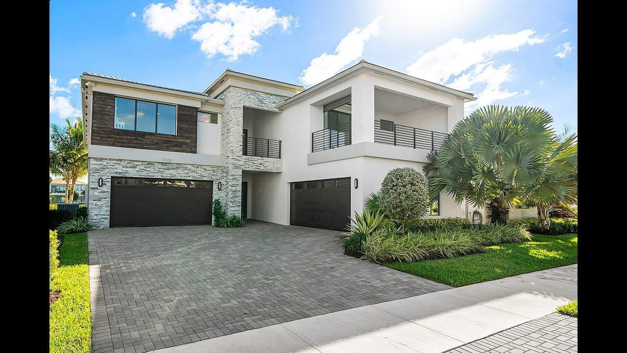 17100 Rainbow Falls Trail - $2,599,000 Contemporary Waterfront home in Lotus, Boca Raton