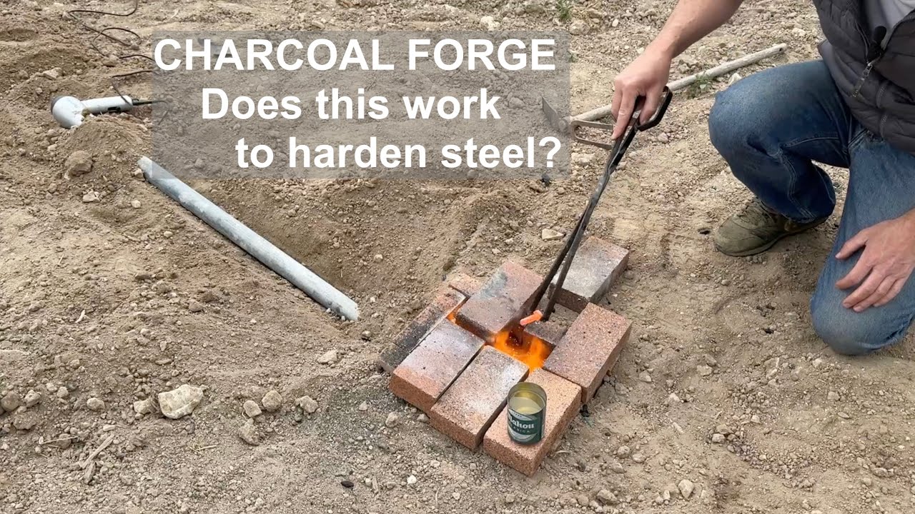Charcoal Forge in the ground to harden steel bolts using a hair dryer blower #forge #blacksmith