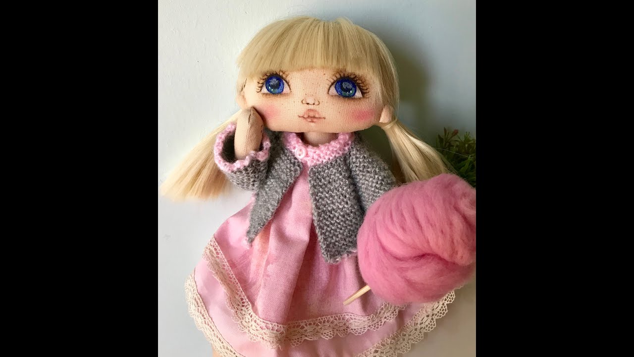 MUÑECA DE TELA CLARA ARTÍCULADA