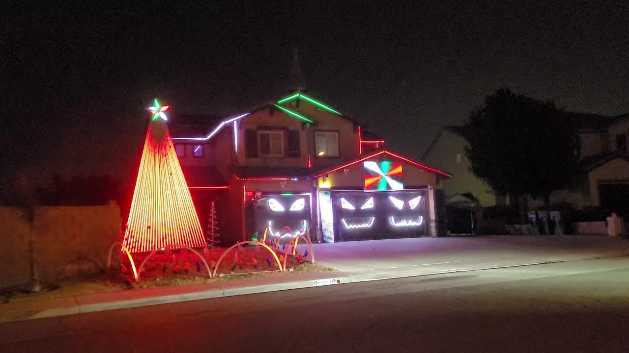 Riverside Christmas Holiday house dancing lights display synchronized with music and video