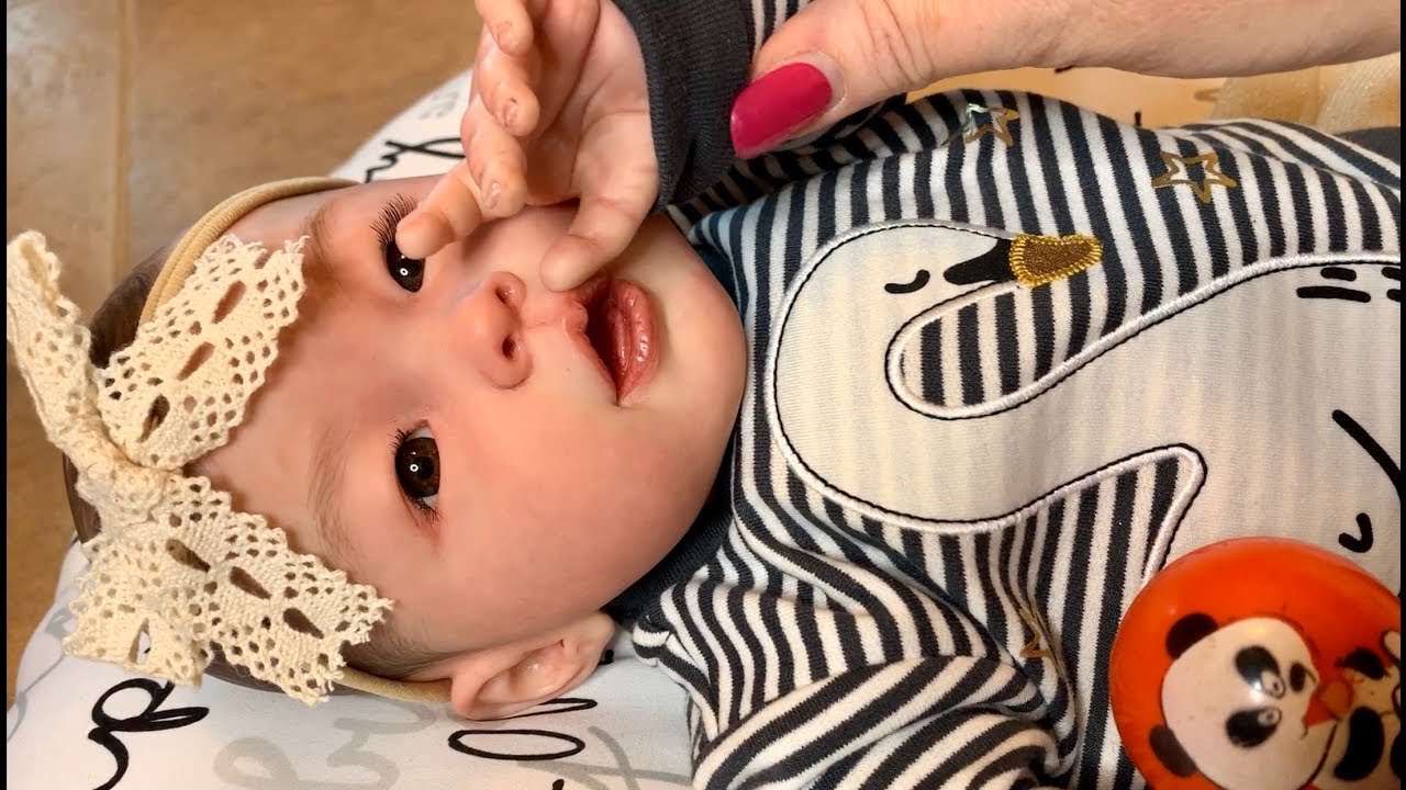 Reborn role-play first changing of our new Asian baby