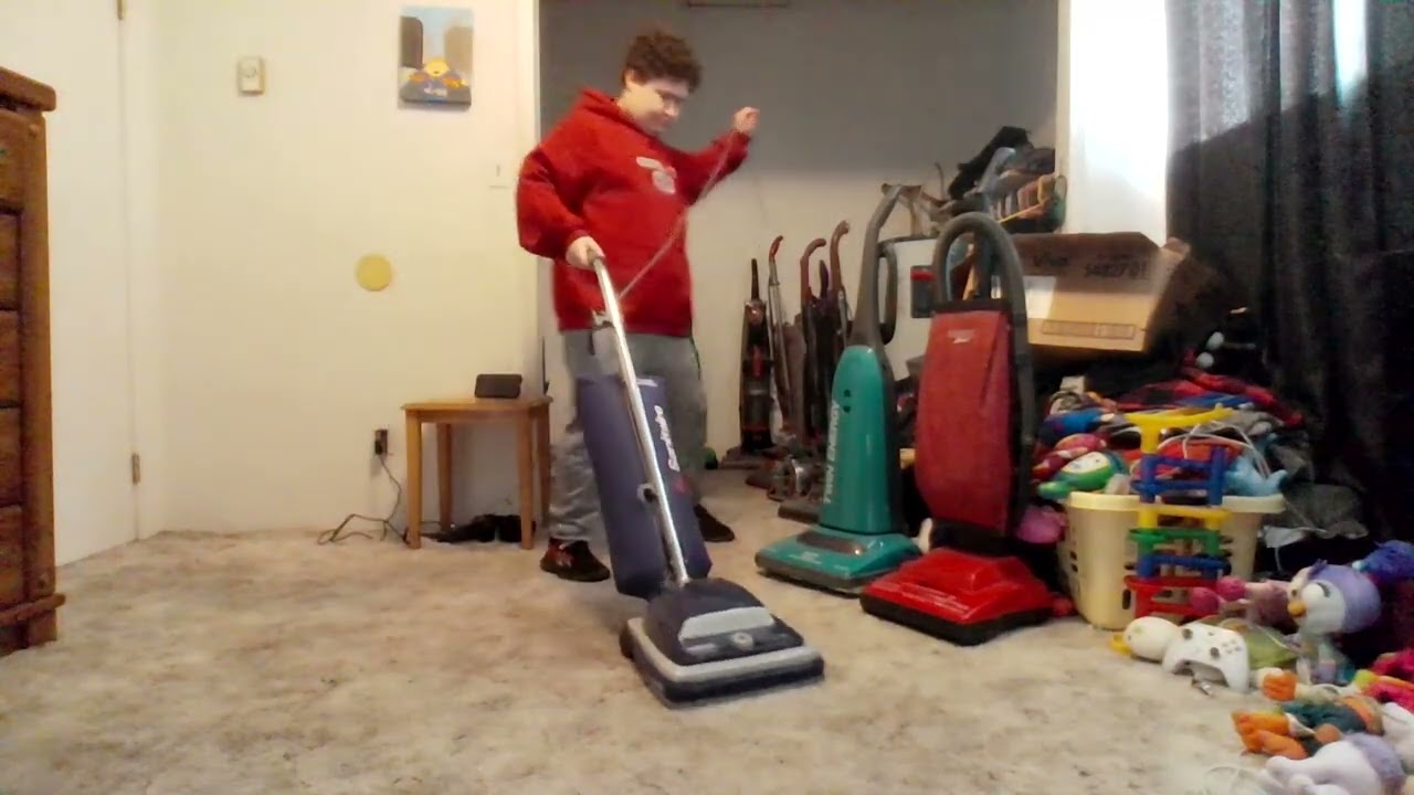 Vacuuming the bedroom with 2008 sanitaire s647 type e