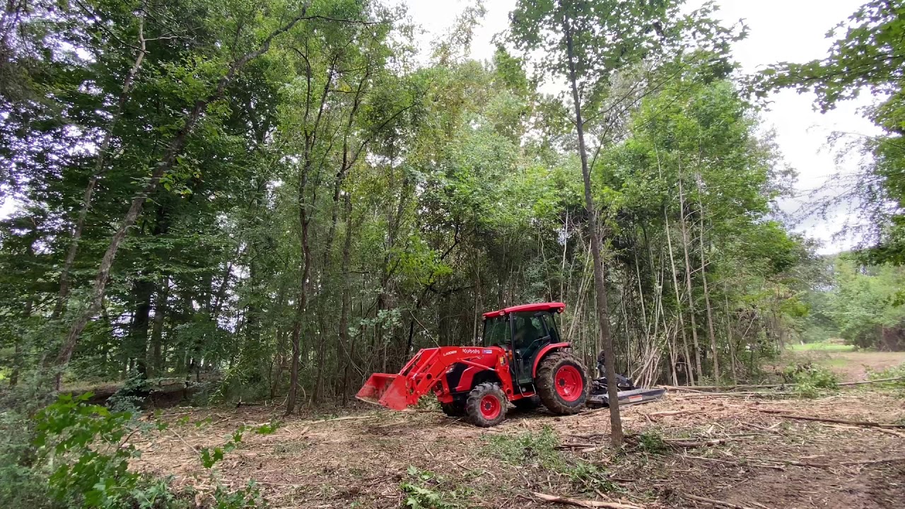 Quick Attach Brush Thrasher mowing the lawn