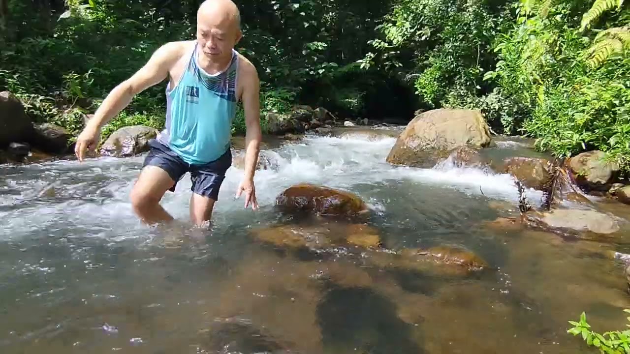 Enjoying the Cool and Fresh River Water in the Village #villagelife #countryside #River #myvillage 